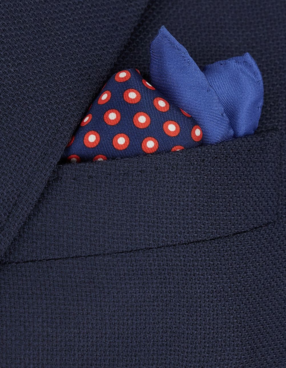 Red pocket square in patterned silk