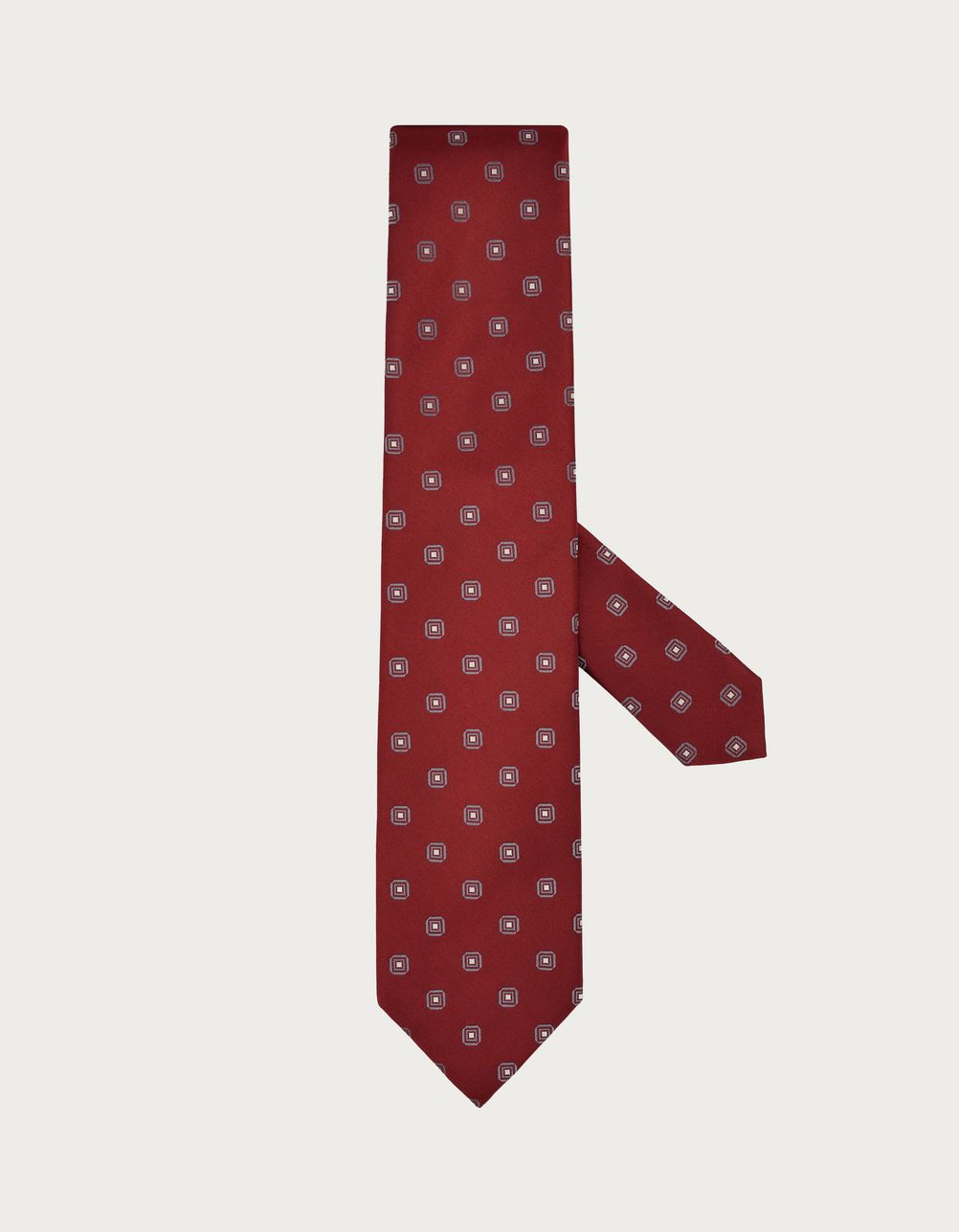 Red silk tie with geometric pattern